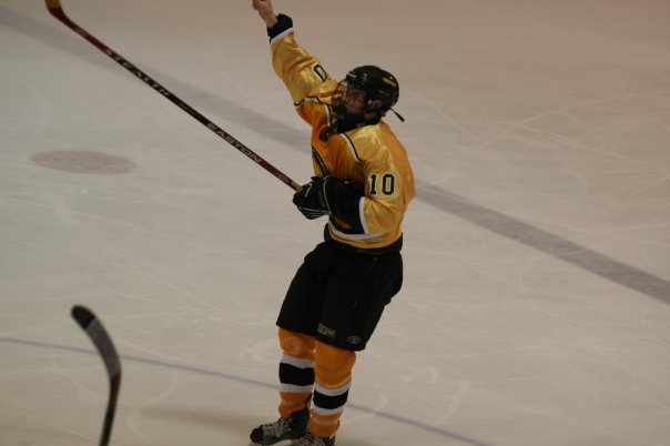 This picture means the most to me. Pointing to Johnny after beating Alpens in OT. RIP buddy. 
